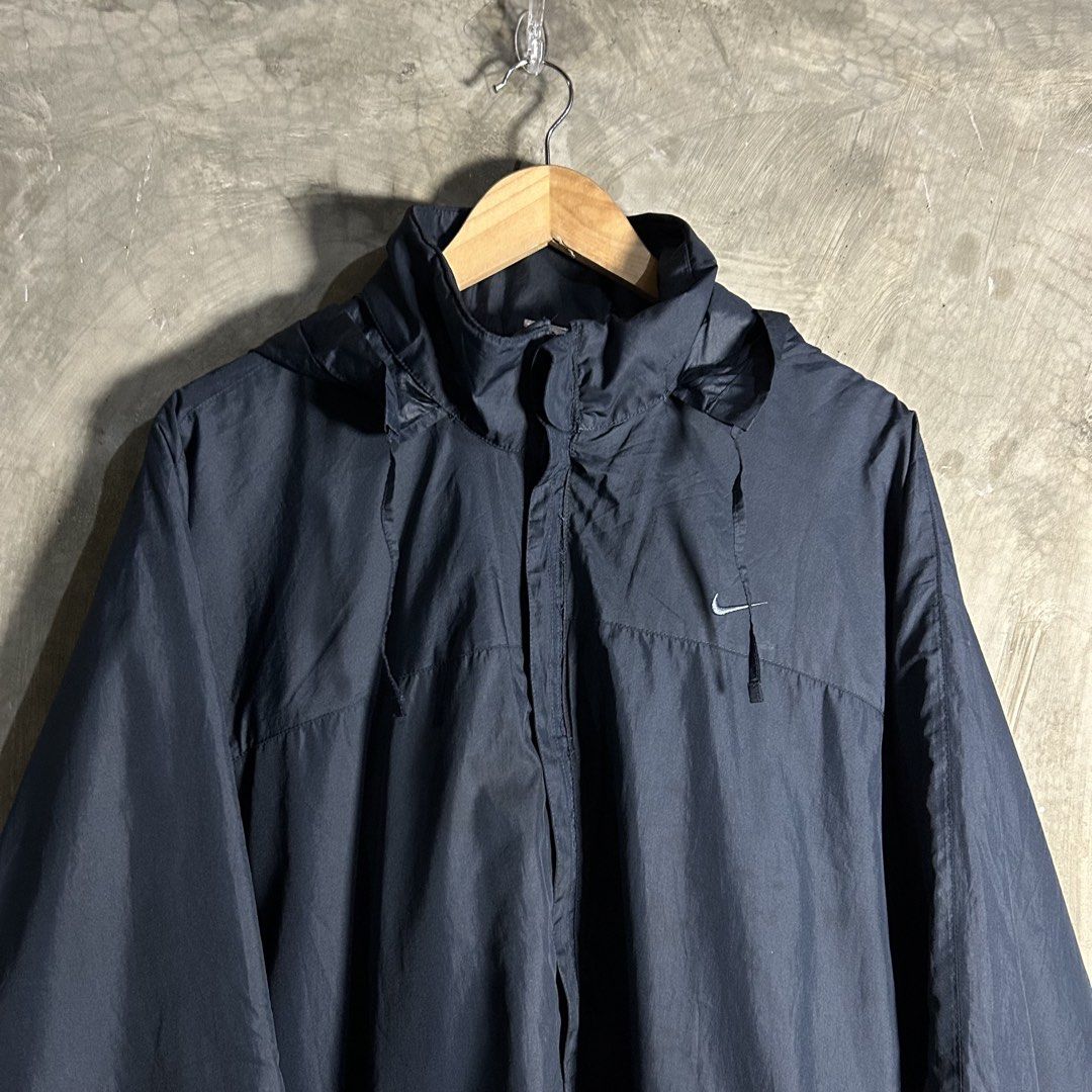 Y2k Nike - Basic Logo Windbreaker (Category: Coats, Jackets and Outerwear) located in Tayabas. Submitted by streetdepartment (Listing ID 1462267681, Image 2). Description: Y2k Nike - Basic Logo Windbreaker Measurements (inches): Width: 25.5” Length: 30.5” Tagged as XXL Packable Hoodie Very good condition Flaw/s: replace zipper, and stains.