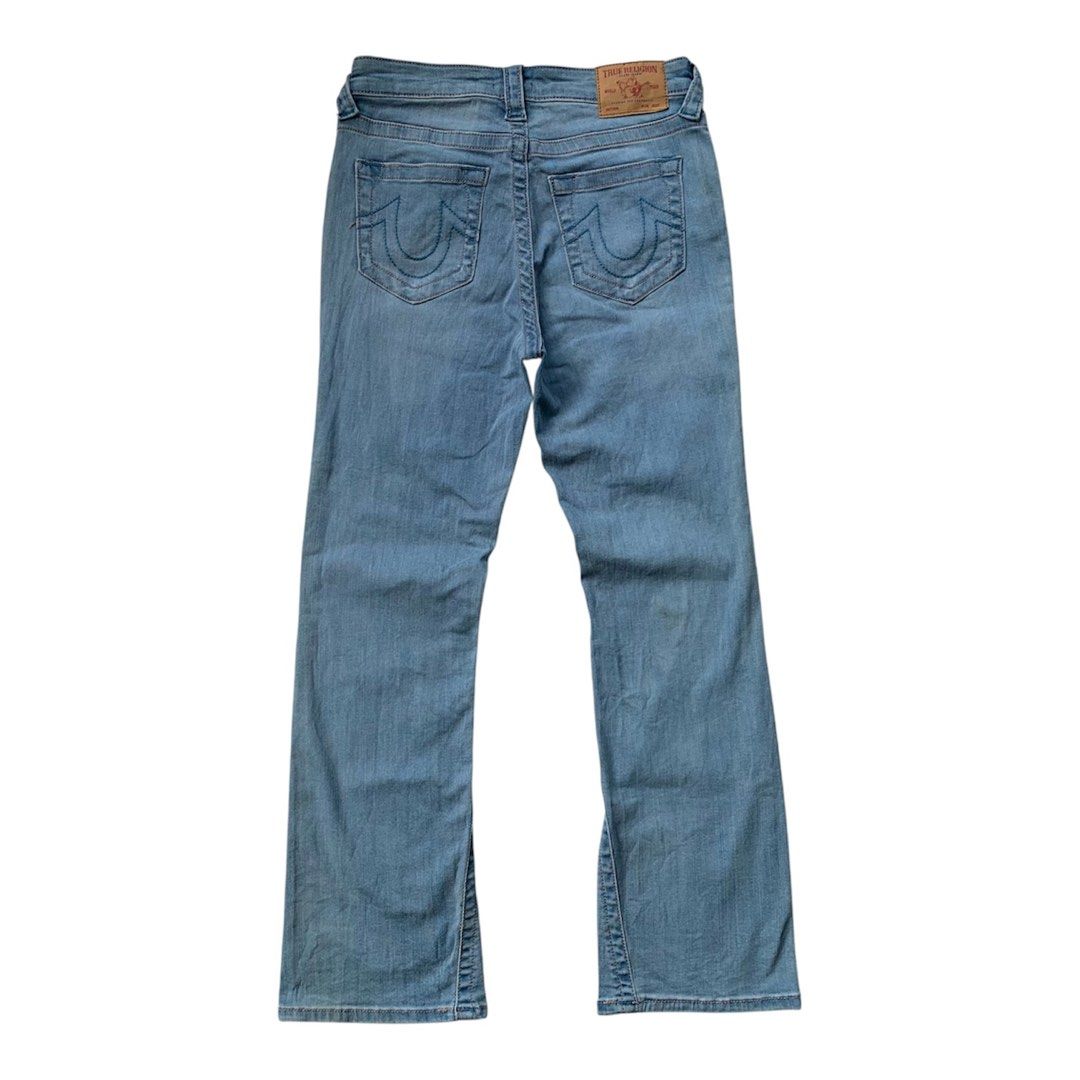 Y2k True Religion Light Washed Bootcut Jeans (Category: Jeans) located in Sindangan. Submitted by holy_thrift (Listing ID 1462263463, Image 1). Description: - Y2k True Religion Light Washed Bootcut Jeans - waist / 27 stretchy can fit up to size 30 - thigh / 10 - length / 36.5 - knee / 7 - leg opening / 7 - stretchy fabric - issue / sa last pic po front ho yan may mga ganyang stain lang po not totally noticeable naman po dahil washed nga ang item 