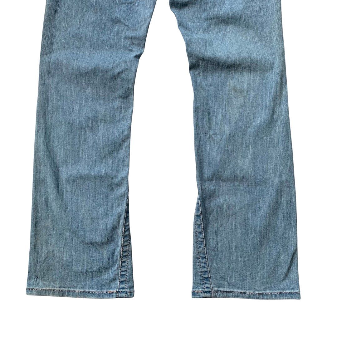 Y2k True Religion Light Washed Bootcut Jeans (Category: Jeans) located in Sindangan. Submitted by holy_thrift (Listing ID 1462263463, Image 3). Description: - Y2k True Religion Light Washed Bootcut Jeans - waist / 27 stretchy can fit up to size 30 - thigh / 10 - length / 36.5 - knee / 7 - leg opening / 7 - stretchy fabric - issue / sa last pic po front ho yan may mga ganyang stain lang po not totally noticeable naman po dahil washed nga ang item 