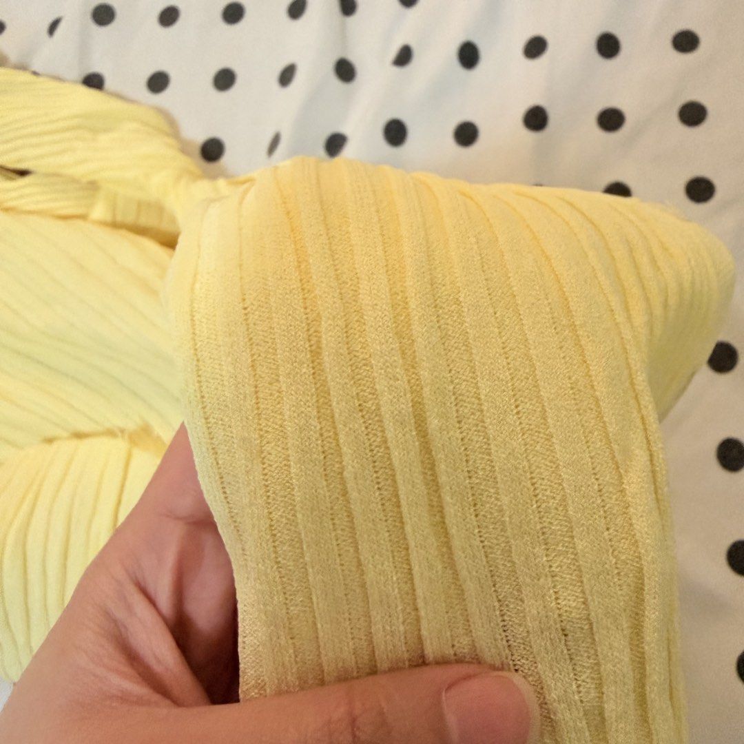 Yellow Ribbed Button-Up Cardigan (Category: Coats, Jackets and Outerwear) located in Pasay City. Submitted by notellyyyy (Listing ID 1462278532, Image 2). Description: - fabric kinda sheer Light yellow ribbed cardigan - Long sleeves - V-neckline - Button-up front - Soft and stretchy material - Ideal for layering over tops or dresses - Perfect for casual outings.