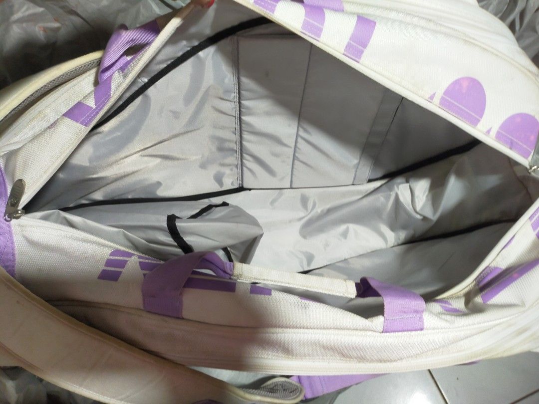 YONEX Tennis Racket Bag for 8 Rackets (Category: Announcements) located in Pasay City. Submitted by 22aileen (Listing ID 1462393096, Image 3). Description: YONEX Tennis Racket Bag for 8 Rackets, White/Purple good condition slightly dirt.
