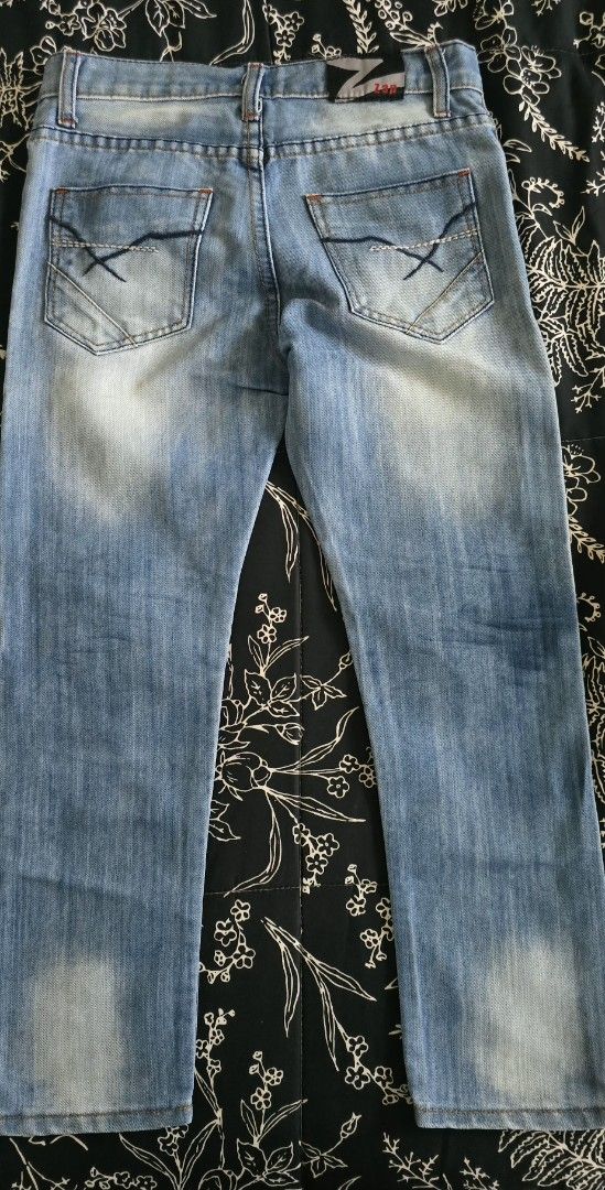 Z Brand Blue Denim Jeans (Category: Babies & Kids Fashion) located in Calamba. Submitted by _arar_ (Listing ID 1462317238, Image 2). Description: - Light wash blue denim jeans - Classic straight leg cut - Zip fly with button closure - Two back pockets with decorative stitching - Measurements: Waist approx. 15 inches, Inseam approx. 30 inches - Ideal for casual wear.
