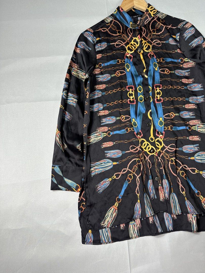 Zara Basic Multi Color Button Up Shirt (Category: Others Tops) located in Cabanglasan. Submitted by thefashiongarage.co (Listing ID 1462263019, Image 3). Description: Title - Zara Multi Color Button Up Shirt Model/Name - Size on Tag - Small Conditiion - Excellent Condition with no issue Dimension (WxLxH) - 19x28 Inches Category- Blouse/Button Up Shirt Fitting - Loose Made in - Morocco Material - 100% Polyester Color - Multi Color Design - Abstrac