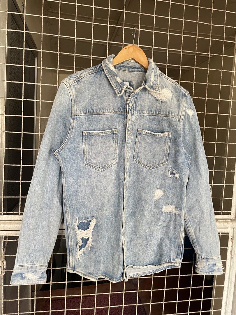 ZARA Distressed Denim Jacket (Category: Formal Shirts) located in Manila. Submitted by oftherack_04 (Listing ID 1462428804, Image 2). Description: Light-wash denim • Relaxed fit • Size M • Heavy distressed detailing • Vintage/Y2K streetwear vibe. A timeless layering piece with that perfectly worn-in look..