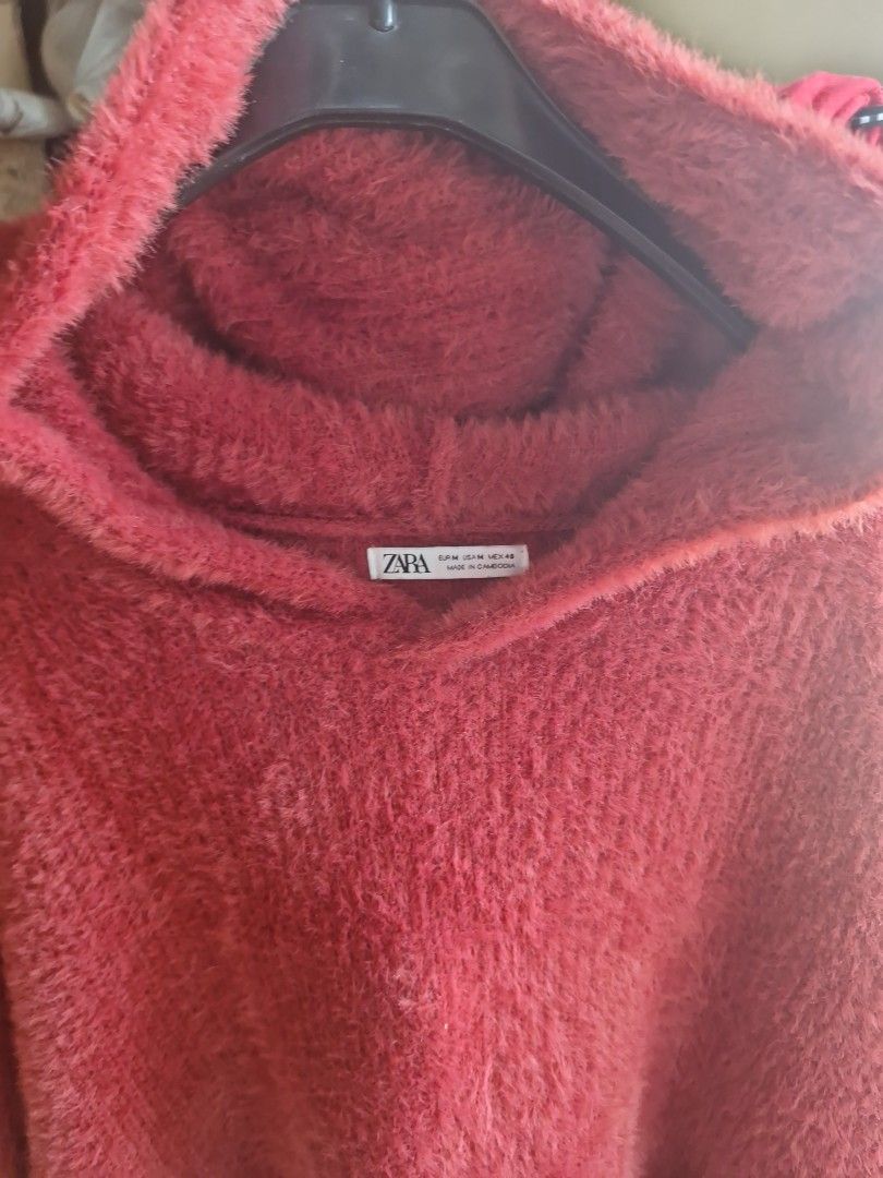 ZARA Fuzzy Knit Sweater (Category: Coats, Jackets and Outerwear) located in Manila. Submitted by musthave1984 (Listing ID 1462318253, Image 1). Description: - Super soft fuzzy knit sweater from ZARA - Cozy reddish-pink color - Ideal for cooler weather, providing warmth - Easy to style with jeans or skirts - A great addition to your wardrobe.