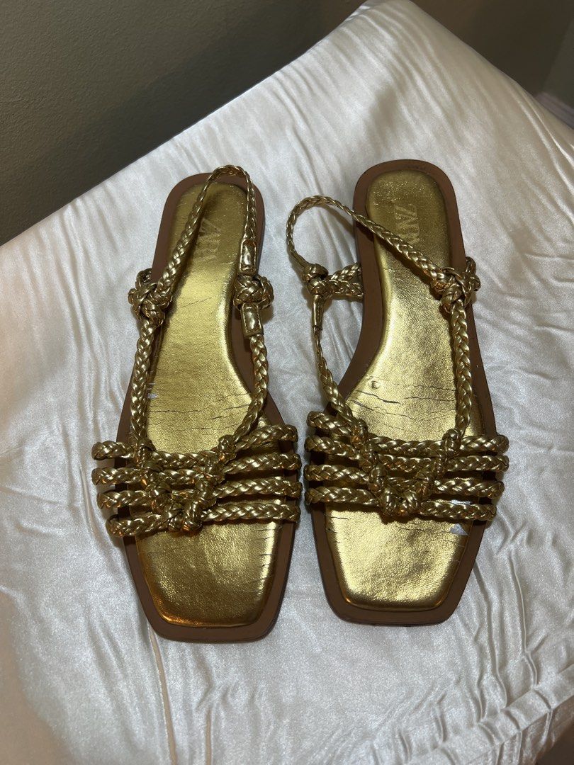 Zara Gold Braided Flat Sandals (Category: Flats & Sandals) located in Makati City. Submitted by noblestorm-6205 (Listing ID 1462380928, Image 1). Description: Gold square toe sandals Size 8 Zara.