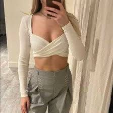 ZARA White Ribbed Long Sleeve Wrap Crop Top (Category: Longsleeves) located in Manila. Submitted by glenkm (Listing ID 1462291349, Image 3). Description: - Original ZARA White Ribbed Long Sleeve Crop Top - Flattering wrap front design - Stretchy material - Used once Shipping: Lalamove or J&T (65 pesos) .