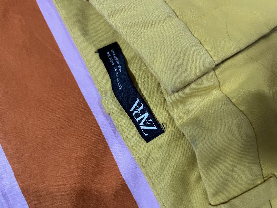 Zara Yellow Straight Leg Trousers (Category: Other Bottoms) located in Mandaluyong City. Submitted by hopeworldplane (Listing ID 1462419169, Image 2). Description: - Zara yellow trousers - Straight leg cut - Zip fly with button closure - Two side pockets - Made in Spain - Ideal for casual or smart casual outfits.