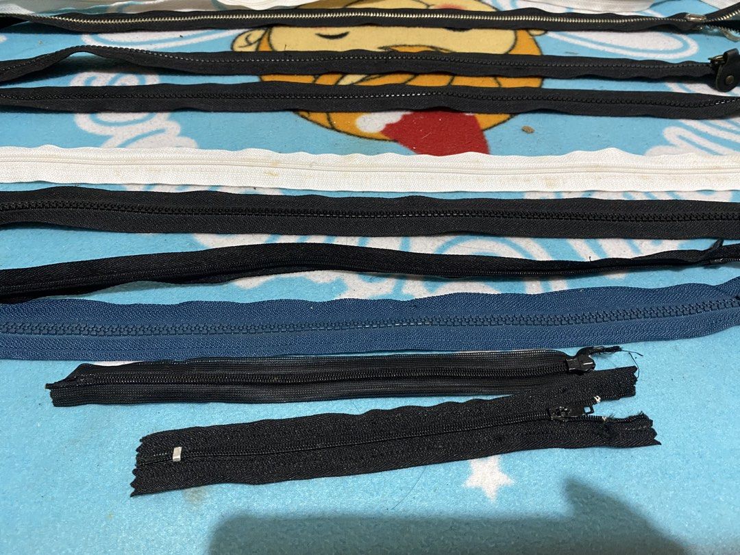 13-Pc Assorted Zippers - Various Colors and Sizes (Category: Craft Supplies & Tools) located in Manila. Submitted by resi.diaz (Listing ID 1462628133, Image 2). Description: - Assorted zipper bundle - Colors: Black, White, Blue, Pink, Maroon - Various lengths available - Types: Metal and Plastic - All zippers are in good, usable condition - Ideal for sewing projects, repairs, and crafting.
