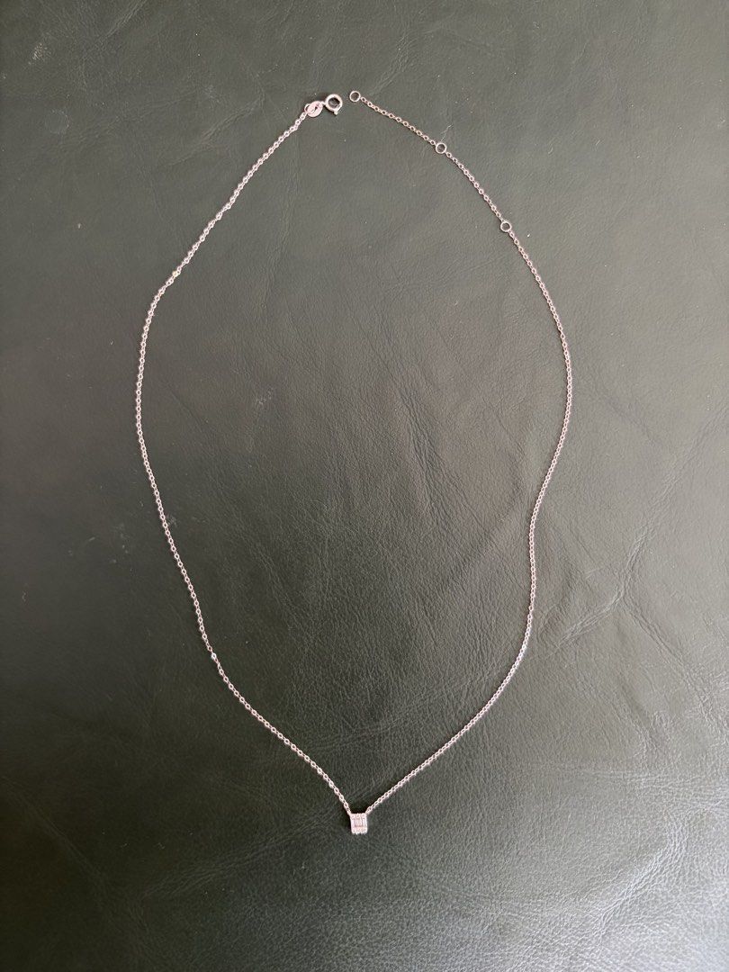 18K Gold Diamond Necklace 0.06ct (Category: Necklaces) located in Las Pinas. Submitted by cath_mill (Listing ID 1462484545, Image 1). Description: Dainty diamond necklace in 18k wg .06 ct natural diamonds HK setting Clean Minimalist look or great for stacking Adjustable 18” wg chain New w certificate Rfs: not using Bpi, BDO, gcash Ships from Las Pinas Thank you .