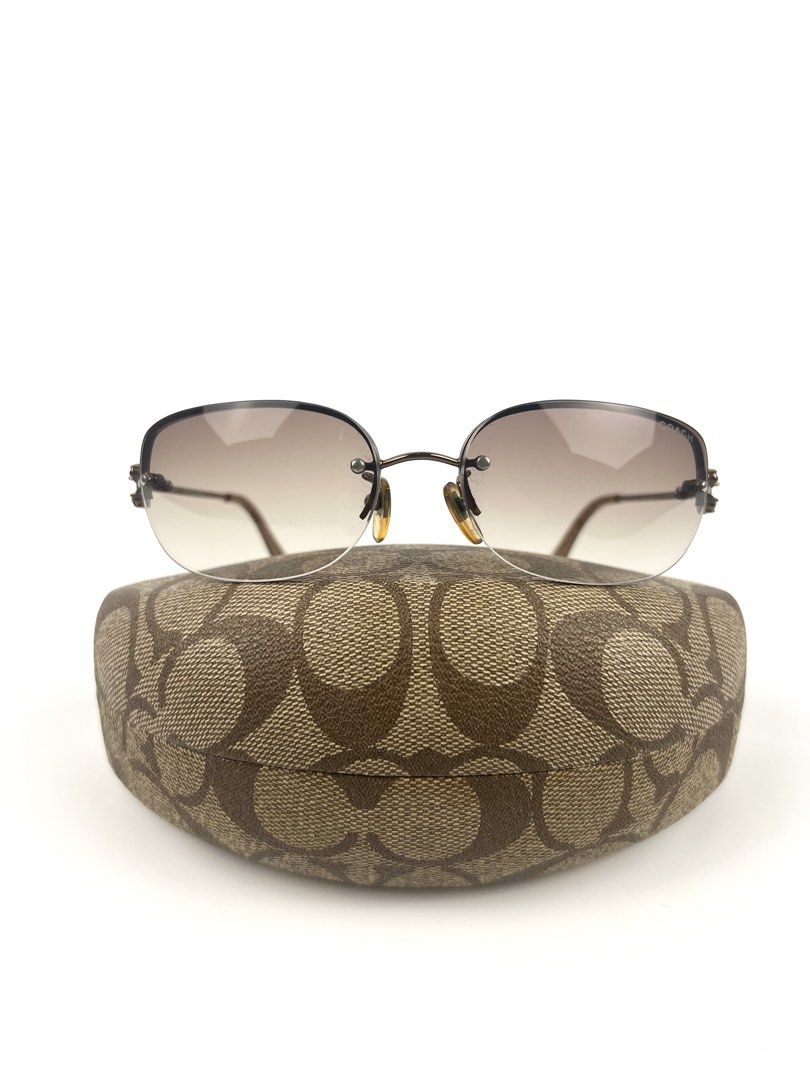 2000’s Coach Evonne Semi Rimless Sunglasses (Category: Sunglasses & Eyewear) located in Angeles City. Submitted by fruits.ph (Listing ID 1462498406, Image 3). Description: Brand: Coach Era: Y2K / Early 2000s Style: Semi Rimless Frame Color: Bronze Lens Color: Brown ***Comes with its authentic Coach protective case.*** MEASUREMENTS Lens height: 50 mm (5 cm) Temple: 120 mm Lens width: 45 mm Condition:8.5/10 Flaws: -Minor dents on frame arm, patina 