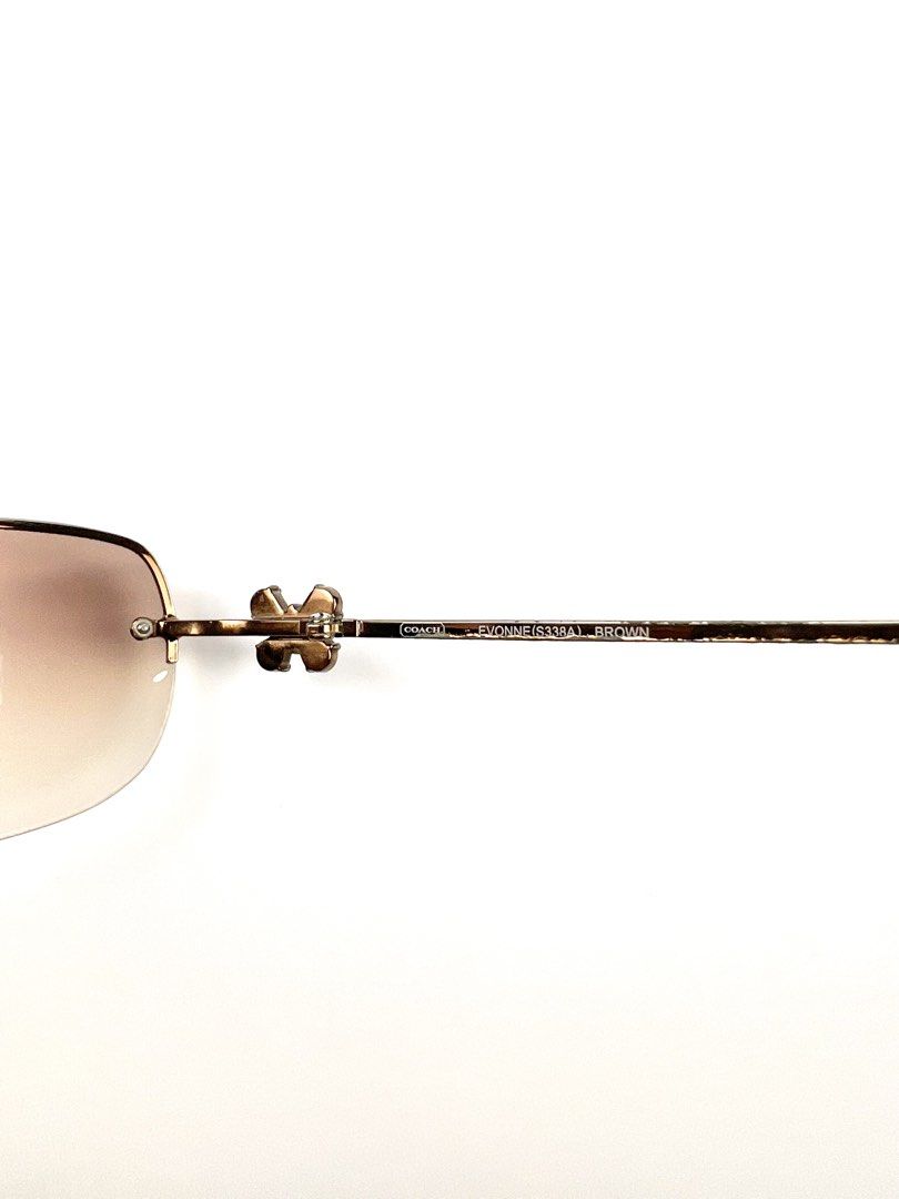 2000’s Coach Evonne Semi Rimless Sunglasses (Category: Sunglasses & Eyewear) located in Angeles City. Submitted by fruits.ph (Listing ID 1462498406, Image 2). Description: Brand: Coach Era: Y2K / Early 2000s Style: Semi Rimless Frame Color: Bronze Lens Color: Brown ***Comes with its authentic Coach protective case.*** MEASUREMENTS Lens height: 50 mm (5 cm) Temple: 120 mm Lens width: 45 mm Condition:8.5/10 Flaws: -Minor dents on frame arm, patina 