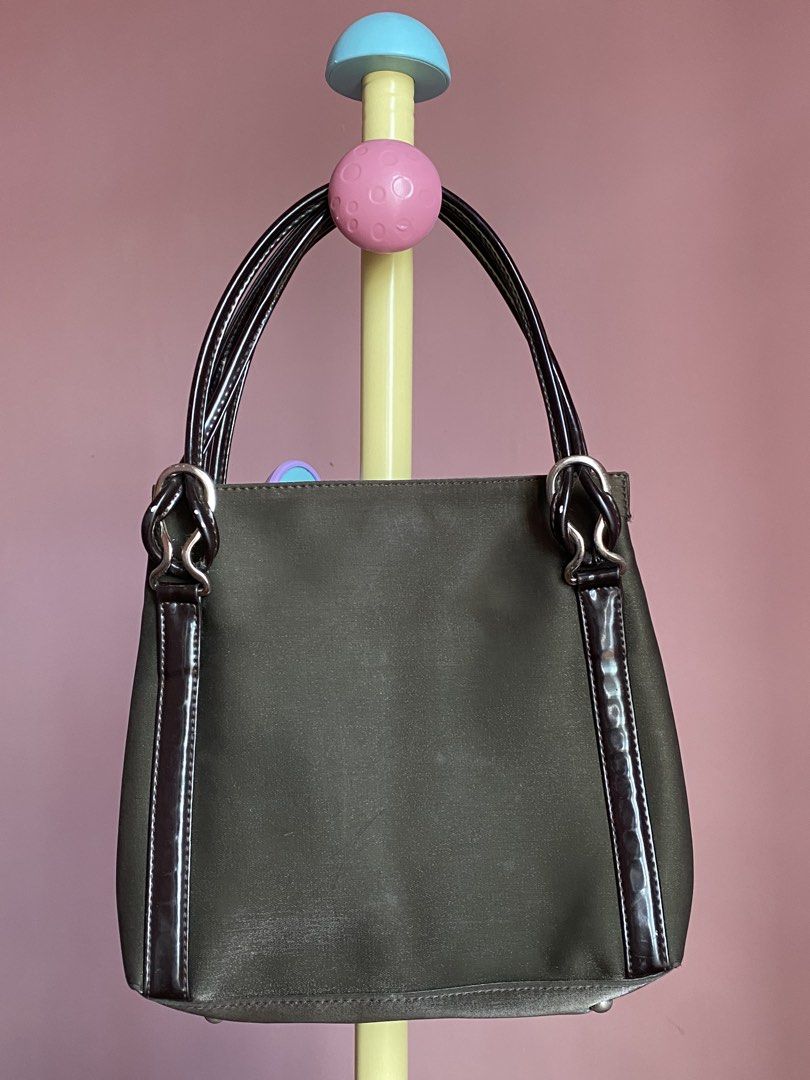 23 ONWARD — Authentic Japanese Nylon Handbag (Category: Tote Bags) located in Binmaley. Submitted by vanilla_style (Listing ID 1462486259, Image 1). Description: Brand: 23 ONWARD Origin: 🇯🇵 Japan — premium Japanese fashion brand Style: Compact everyday tote / handbag Details: Color: Olive Green main body + Dark Brown patent leather trims & handles Material: Durable lightweight nylon fabric + glossy patent leather accents Closure: Magnetic snap 