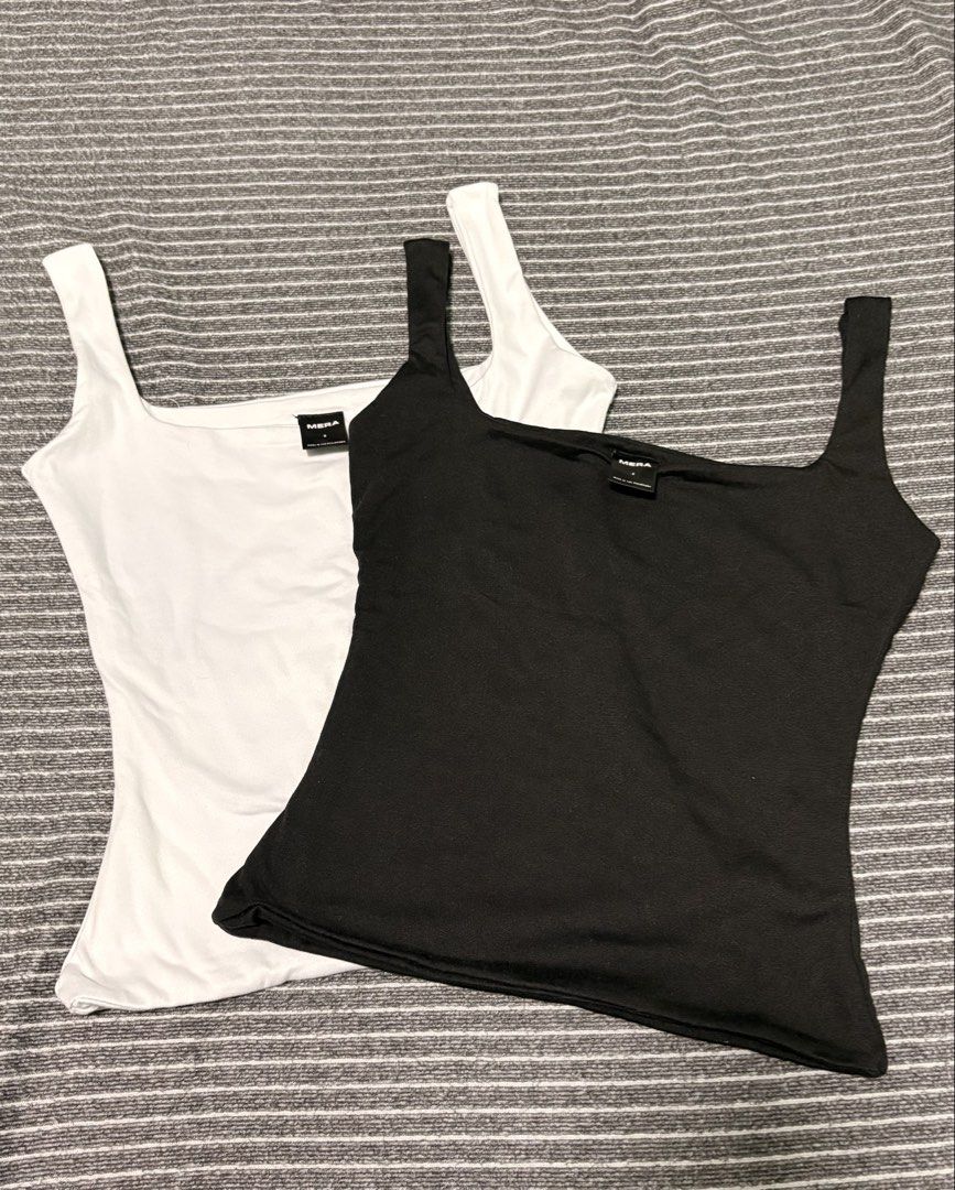 Tank Top Set (Category: Others Tops) located in Manila. Submitted by amara.archives (Listing ID 1462560537, Image 1). Description: DETAILS: •Take 2 for 150 • Never worn • Small • Black & White set RFS: Decluttering / Too small for me 📍Location: Project 6, Quezon City BE 💵 MOP: GCash / Bank Transfer NOTES: •First to pay = first to get the item •No cancellation after payment •Please ask questions before buying •Actual photos posted •Strictly no r