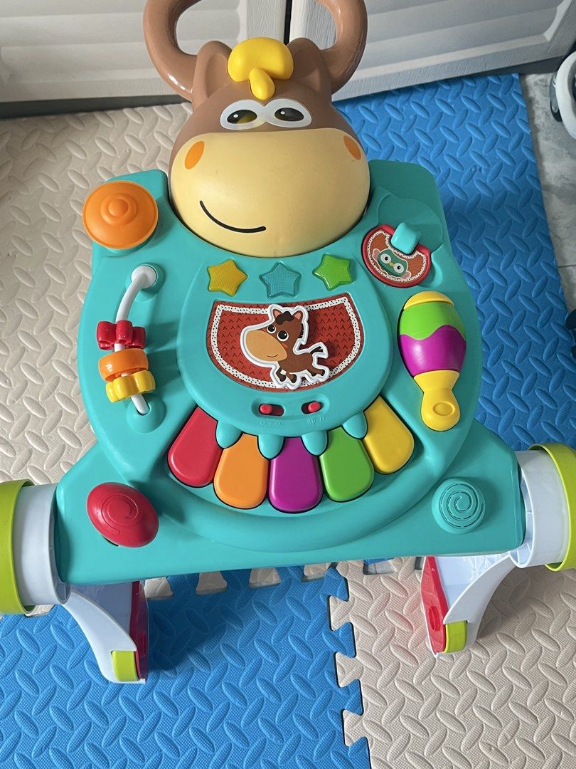 3-in-1 walker for baby (Category: Infant Playtime) located in Manila. Submitted by athenuhhhh (Listing ID 1462649067, Image 2). Description: Minimal use since nakalakad agad si baby. With battery but no box.