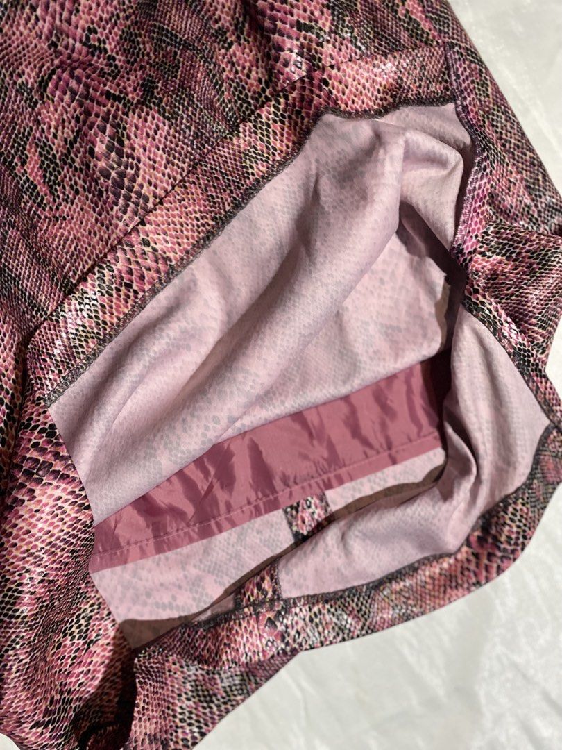 80s Pink Snake Print Midi Skirt (Category: Skirts) located in Paranaque City. Submitted by kuweefindsmnl (Listing ID 1462603262, Image 3). Description: - Vintage 80s midi skirt - Bold pink snake print - Features a side slit - Waist: 26 inches - Length: 24 inches - JP wash tag only.