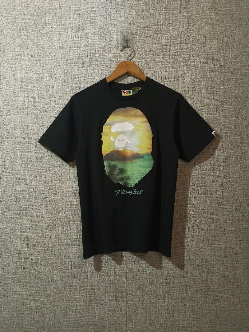 A Bathing Ape "A Rising Bape" Tee (Category: Tshirts & Polo Shirts ) located in Libmanan. Submitted by dionela21 (Listing ID 1462490080, Image 1). Description: Bape "A rising bape" Tee Size Small 18" x 26.5" As New Condition No issue Needs wash only (fresh from bale) 🏷️3500 + sf Location: CAMARINES SUR, LUZON 📌 .