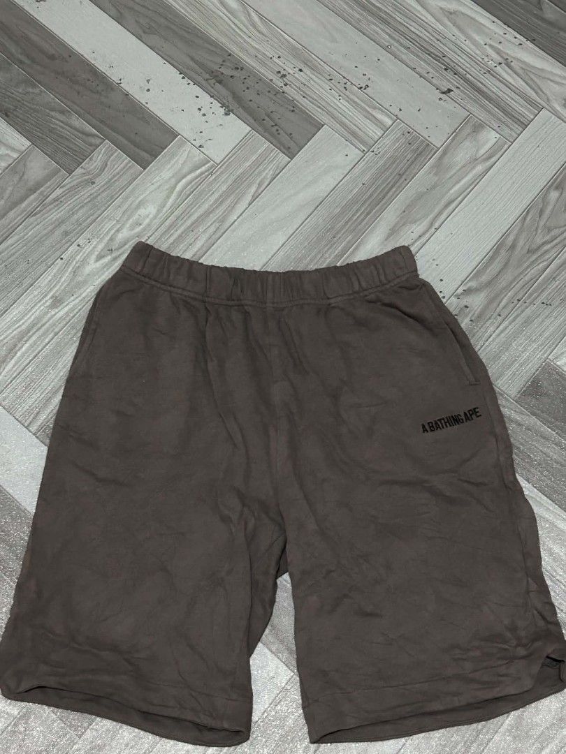 A BATHING APE Shorts Brown BAPE (Category: Shorts) located in Manila. Submitted by tantmzn (Listing ID 1462656389, Image 1). Description: - Brand: A BATHING APE - Color: Brown - Features: Elastic waistband, back pocket with BAPE logo patch - Fit: Comfortable - Ideal for: Casual wear FOR SALE!! BAPE SHORT COLOR: DARK GREY WAIST:24-36 LENGTH 20 ISSUE: NO TAGS (OFF) DM FOR MORE DETAILS .