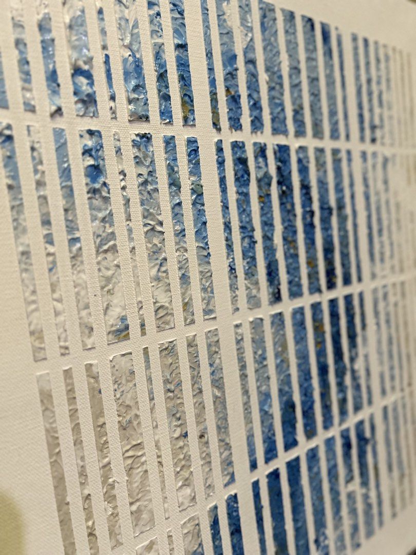 Abstract Blue and White Striped Framed Wall Art (Category: Wall Decor) located in Pasig City. Submitted by metrohotelsupply (Listing ID 1462512429, Image 2). Description: - Textured abstract art piece - Features vertical stripes in blue and white - Mounted on canvas with a light wood frame - Modern aesthetic for any room - Ready to hang.