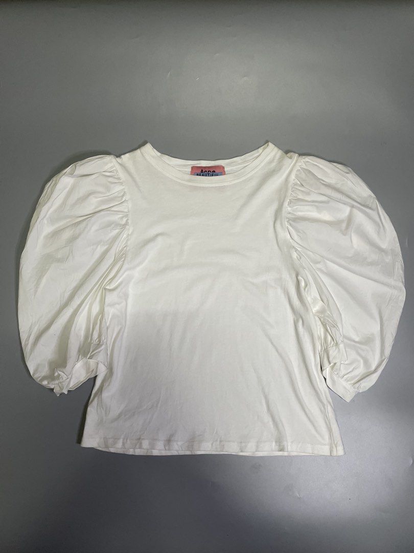 Acne studios puff sleeves blouse (Category: Luxury Apparel) located in Bocaue. Submitted by mosthighcollective (Listing ID 1462559211, Image 1). Description: Acne studios puff sleeves blouse Size: S-M Dimes: 17 width 21 length Excellent condition No issue Cut washtag 1000 only Dm me to purchase 📥.