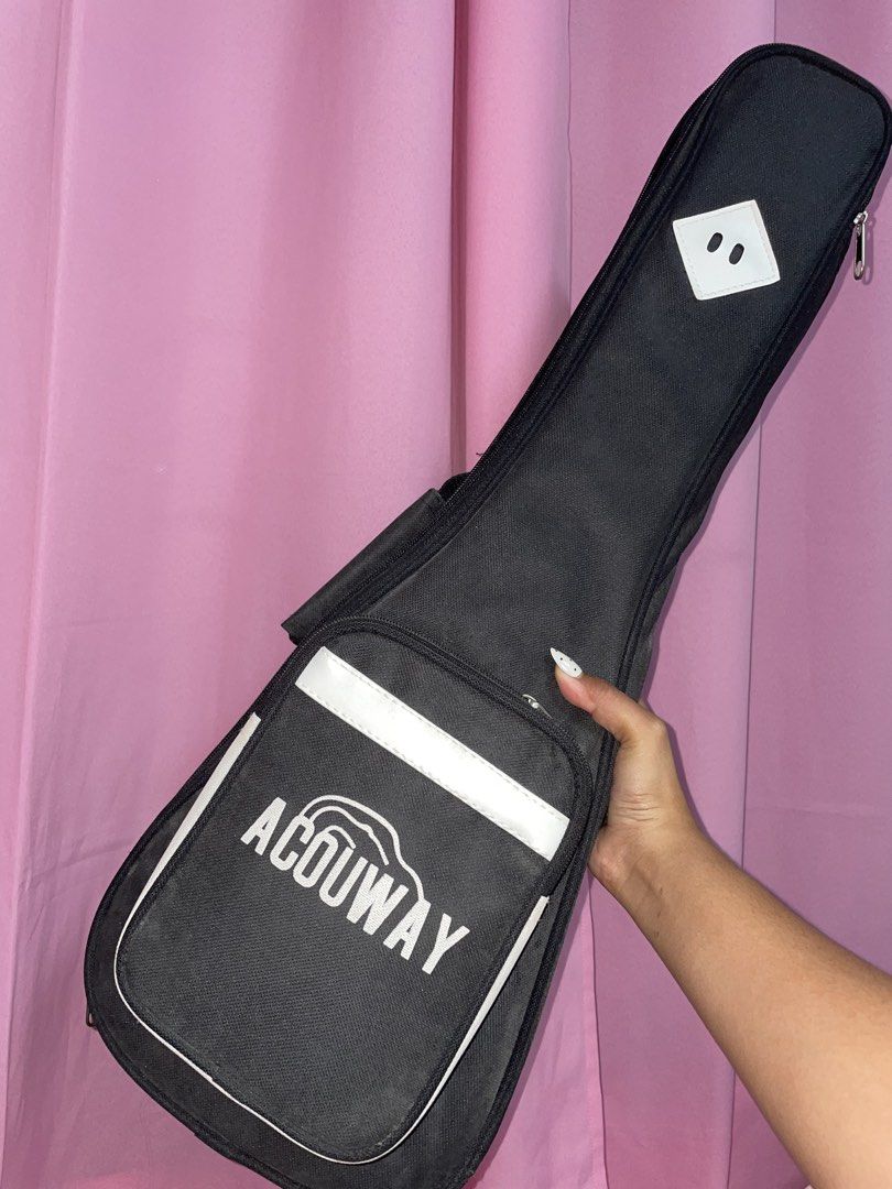Acouway Ukulele with accessories (Category: Musical Instruments) located in Manila. Submitted by roxyqk (Listing ID 1462470626, Image 3). Description: - Acouway tuner, Colorful strap, Set of guitar picks, Capo, String, Small leather pouch, and bag - With stand! - Ideal for beginners - Used but not abused - Never got to learn how to play - Been years na hindi nagamit - NON NEGOTIABLE! this is the lowest price already .