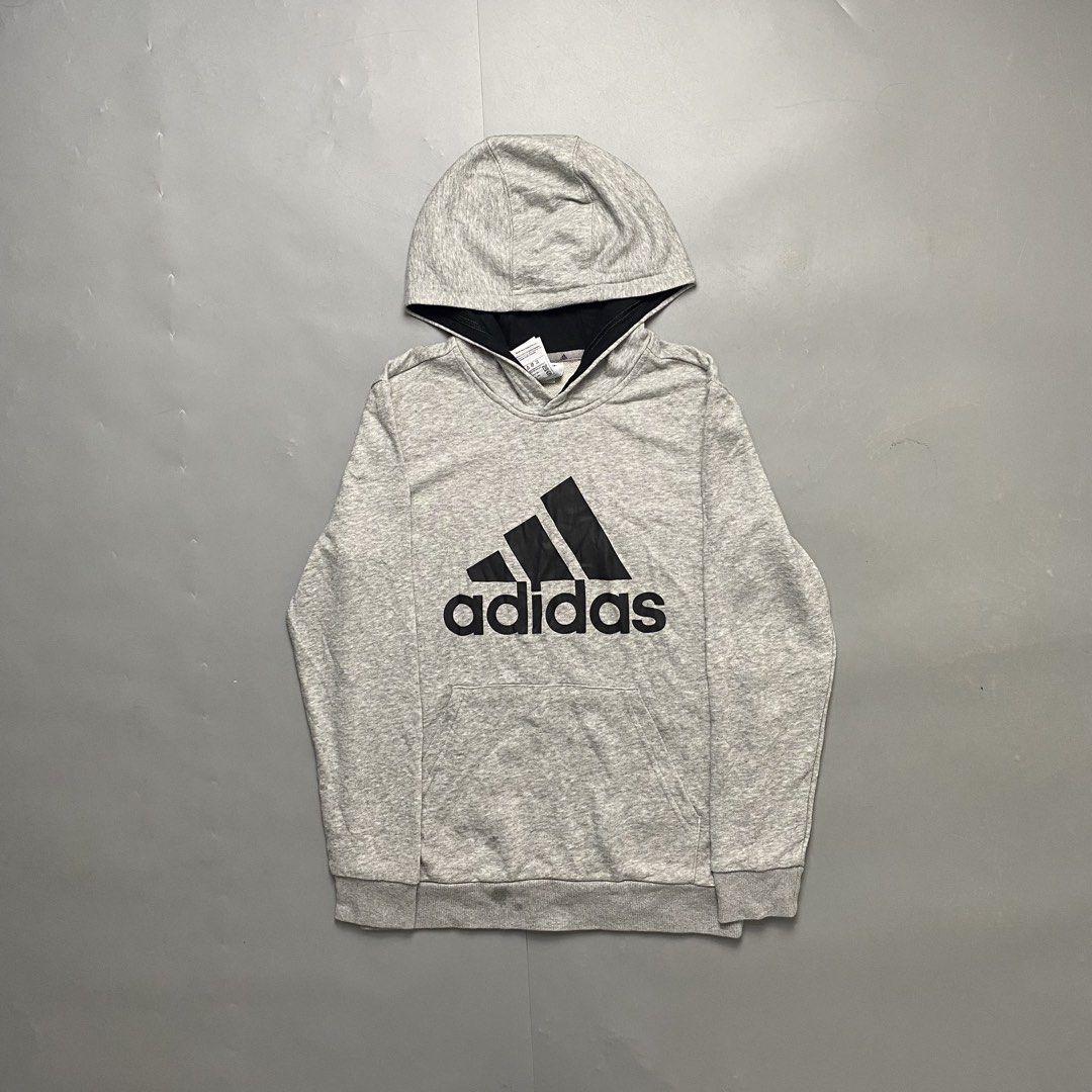ADIDAS 🧥| Gray Big Logo Pullover Hoodie (Category: Hoodies) located in Bulacan. Submitted by orc.ph (Listing ID 1462582633, Image 1). Description: ADIDAS 🧥| Gray Big Logo Pullover Hoodie Material Used: 50% Cotton 50% Polyester •Gray •Big Adidas Badge Of Sports Logo •Front Kangaroo Pouch •Ribbed Knit Cuffs And Hem •No Hood Drawstring •Casual Wear •Streetwear Size: M Width: 19 Length: 24.5 Pristine Condition. None Visible Issue. ISSUE: NONE ⚠️ No