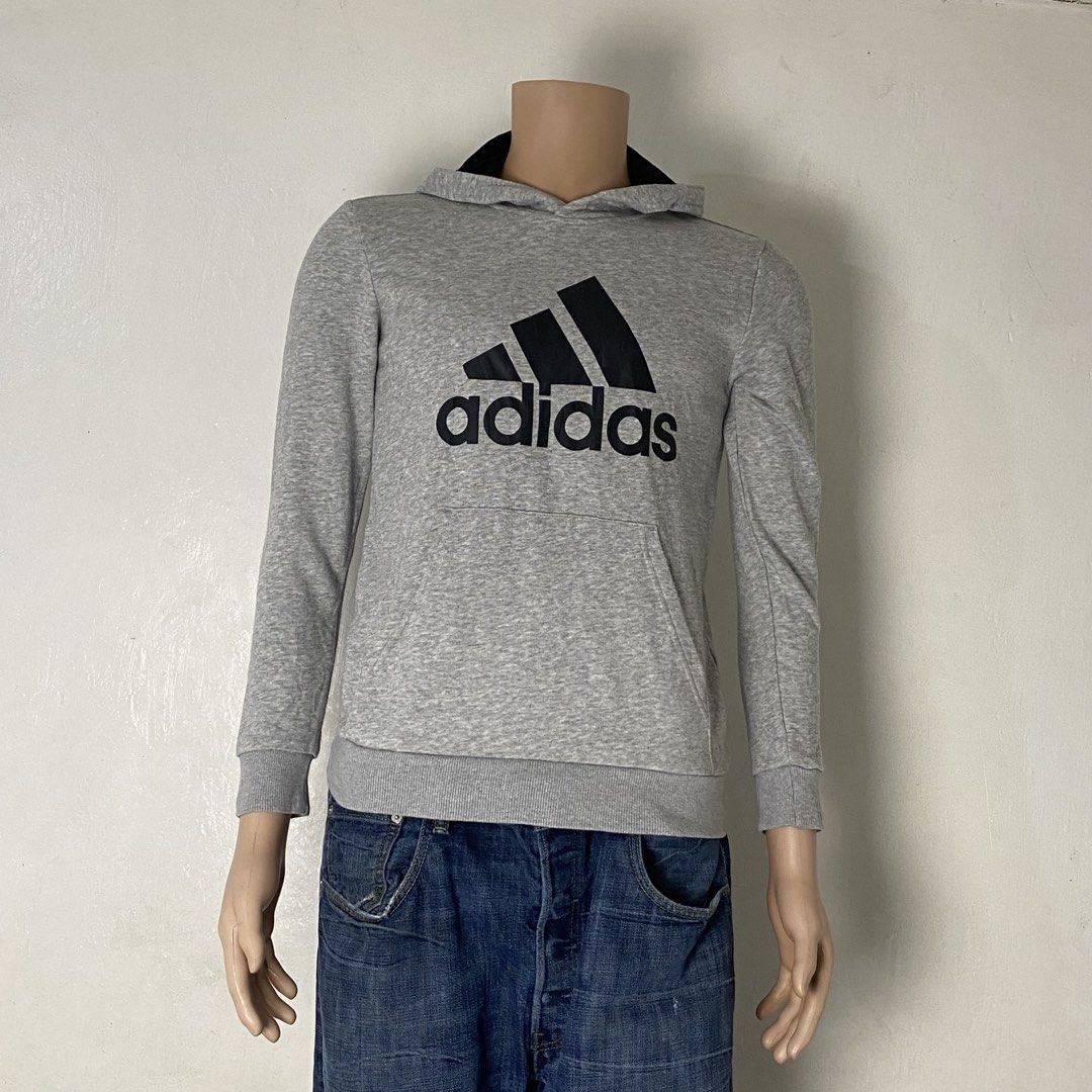 ADIDAS 🧥| Gray Big Logo Pullover Hoodie (Category: Hoodies) located in Bulacan. Submitted by orc.ph (Listing ID 1462582633, Image 2). Description: ADIDAS 🧥| Gray Big Logo Pullover Hoodie Material Used: 50% Cotton 50% Polyester •Gray •Big Adidas Badge Of Sports Logo •Front Kangaroo Pouch •Ribbed Knit Cuffs And Hem •No Hood Drawstring •Casual Wear •Streetwear Size: M Width: 19 Length: 24.5 Pristine Condition. None Visible Issue. ISSUE: NONE ⚠️ No