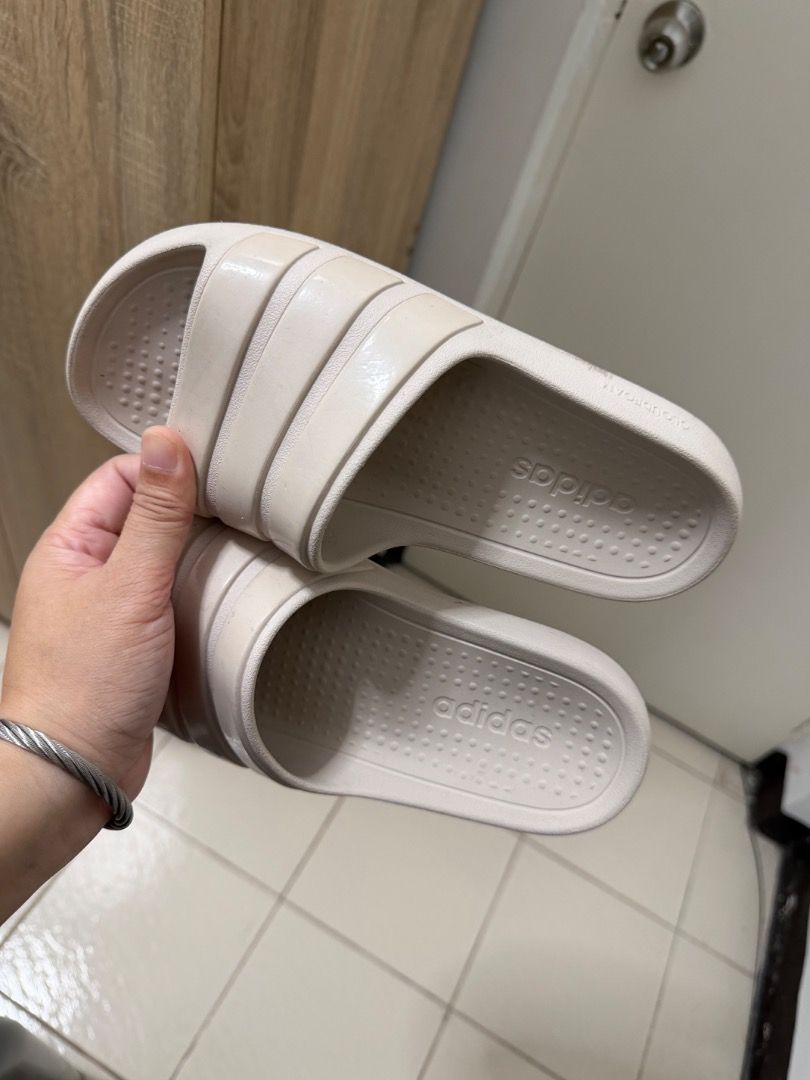 Adidas Cloudfoam Slides Beige (Category: Slippers and slides) located in Caloocan City. Submitted by kosmofrance (Listing ID 1462458877, Image 2). Description: - Adidas slides in a light beige color. - Features the iconic three stripes on the strap. - Equipped with Cloudfoam cushioning for ultimate comfort. - Easy slip-on design for convenience. - Ideal for everyday casual wear or recovering after sports..