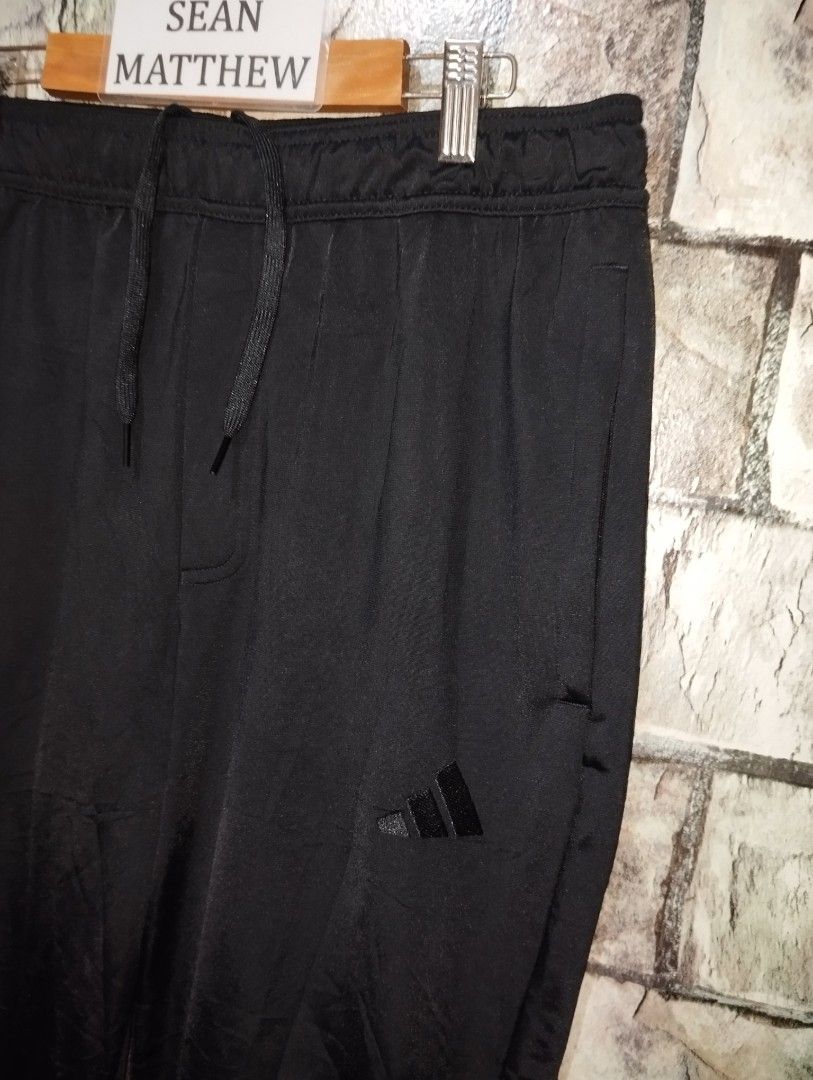 Adidas Men's Essentials Tricot Track Pants (Category: Activewear) located in Los Banos. Submitted by streetthrift_ph (Listing ID 1462586607, Image 2). Description: Adidas Men's Essentials Tricot Track Pants (With ankle zip) Medium on tag Waistline : 30-39 Stretch Length : 41.5 Hem : 6 Excellent condition Price : 1680 only Free Shipping! Payment first ✅ Mop : Gcash only Courier : J&T Express 📍 Los Baños Laguna Thanks!.