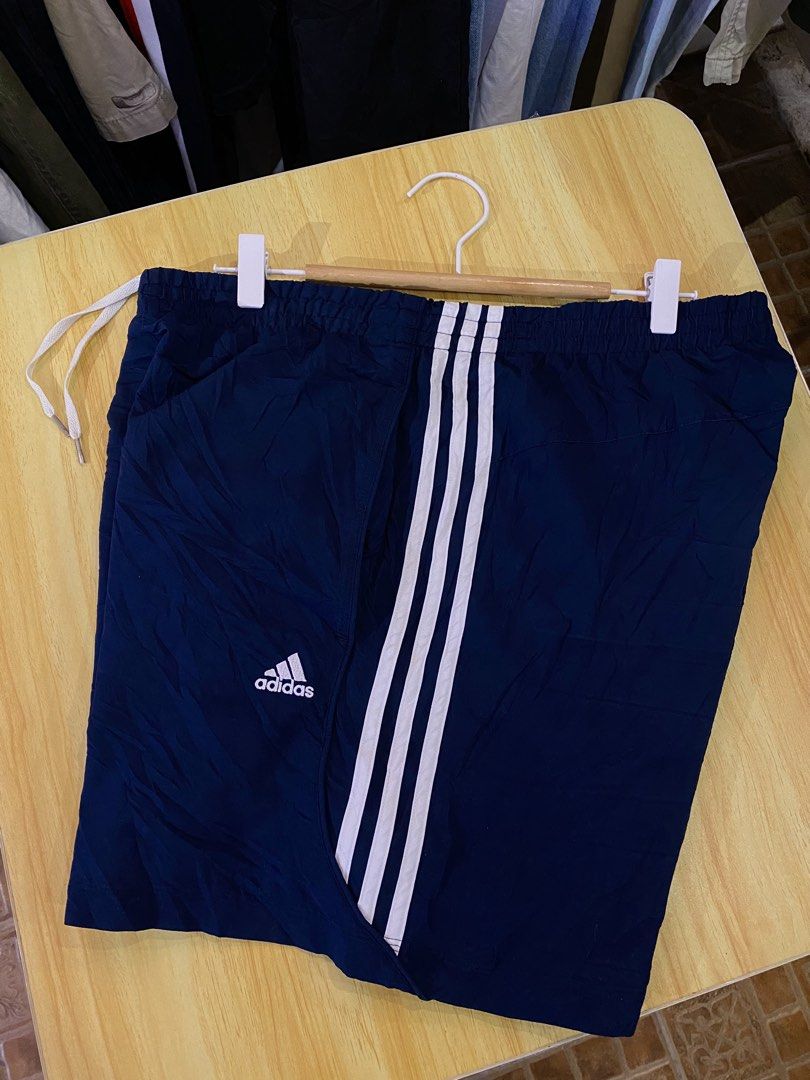 Adidas Navy blue triple Stripes (Category: Shorts) located in Manila. Submitted by thriftvibes324 (Listing ID 1462470330, Image 1). Description: Size Xl Colorate 9.8/10 Dimes -34-36 Length: 16 Issue❌.