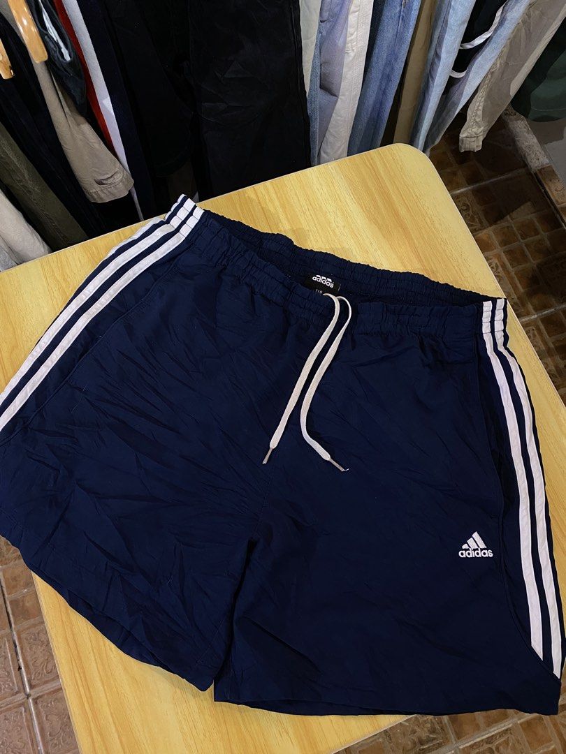 Adidas Navy blue triple Stripes (Category: Shorts) located in Manila. Submitted by thriftvibes324 (Listing ID 1462470330, Image 2). Description: Size Xl Colorate 9.8/10 Dimes -34-36 Length: 16 Issue❌.