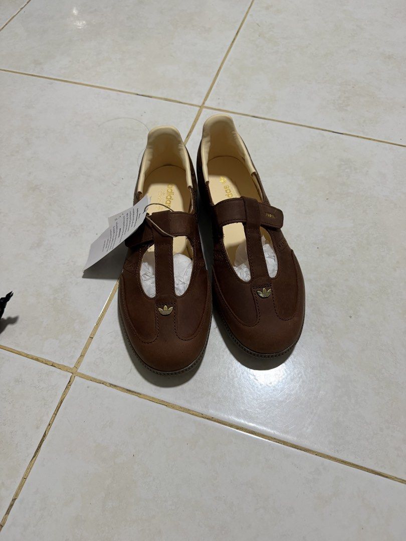 ADIDAS SAMBA JANE W 🤎 (Category: Sneakers) located in Tagaytay City. Submitted by chezcaab (Listing ID 1462613548, Image 2). Description: - Brand: Adidas - Model: Samba Jane W - Color: Brown - Material: Leather - Features: Mary Jane strap, classic gum sole - Condition: Brand new with original tags - Size: US 6 / UK 4.5 / JPN 230 Condition: Brand new, never worn RFS: Wrong size — bought in Bangkok, Thailand Note: No original box included. Shoes o