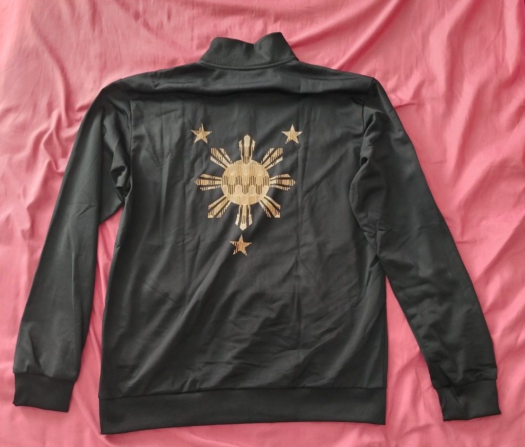 Adidas Team Philippines Track Jacket and Pants Set (Category: Activewear) located in Quezon City. Submitted by gabbys_closet16 (Listing ID 1462456418, Image 2). Description: - Authentic Adidas tracksuit set for Team Philippines. - Size : Large - Color: Black with gold accents. - Jacket features 'PHILIPPINES' text and national emblem on the back. - Track pants have the iconic Adidas logo. - Brand new with tags still attached. - Original price : 46