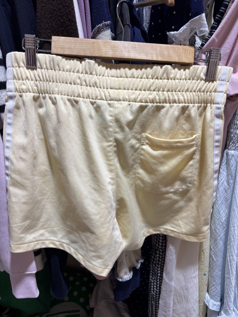Adidas Yellow Shorts with 3 Stripes (Category: Shorts) located in Balagtas. Submitted by sabrinacarpenteroww (Listing ID 1462520022, Image 2). Description: fits 27-30.