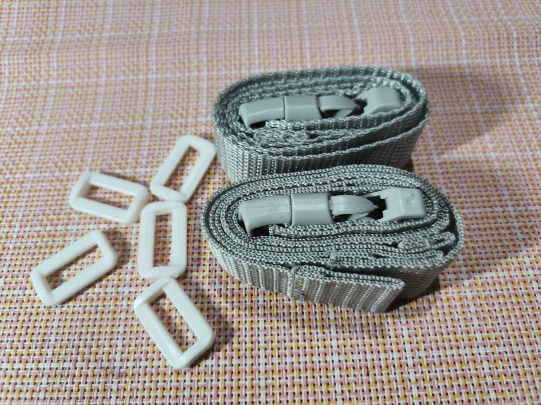 Adjustable Webbing Straps with Buckles and Loops (Category: Everything Else Others) located in San Leonardo. Submitted by burgossanleonardo.12345 (Listing ID 1462602918, Image 3). Description: - Set of 2 adjustable webbing straps - Light grey color - Features plastic buckles for secure fastening - Includes multiple plastic rectangular loops - Ideal for DIY projects, bag repairs, and custom strap creation - All items are brand new and sealed in or