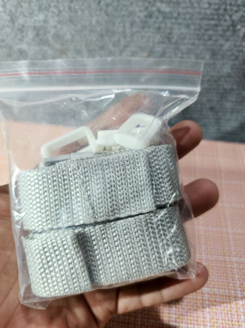 Adjustable Webbing Straps with Buckles and Loops (Category: Everything Else Others) located in San Leonardo. Submitted by burgossanleonardo.12345 (Listing ID 1462602918, Image 2). Description: - Set of 2 adjustable webbing straps - Light grey color - Features plastic buckles for secure fastening - Includes multiple plastic rectangular loops - Ideal for DIY projects, bag repairs, and custom strap creation - All items are brand new and sealed in or