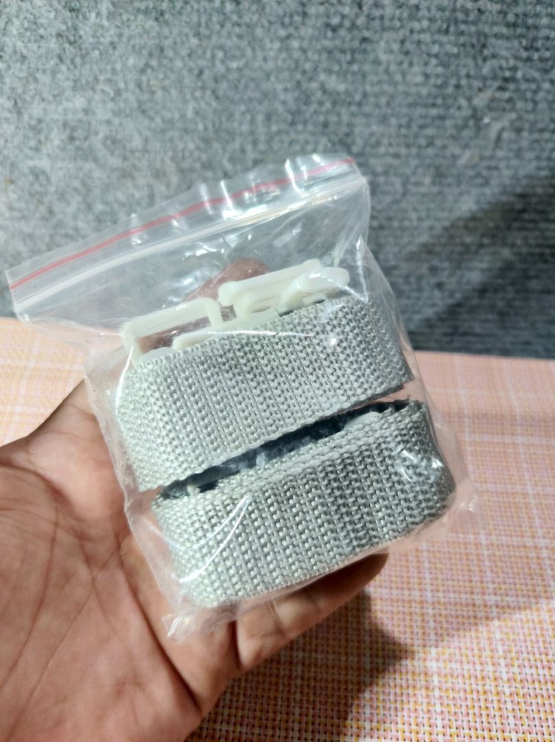 Adjustable Webbing Straps with Buckles and Loops (Category: Everything Else Others) located in San Leonardo. Submitted by burgossanleonardo.12345 (Listing ID 1462602918, Image 1). Description: - Set of 2 adjustable webbing straps - Light grey color - Features plastic buckles for secure fastening - Includes multiple plastic rectangular loops - Ideal for DIY projects, bag repairs, and custom strap creation - All items are brand new and sealed in or