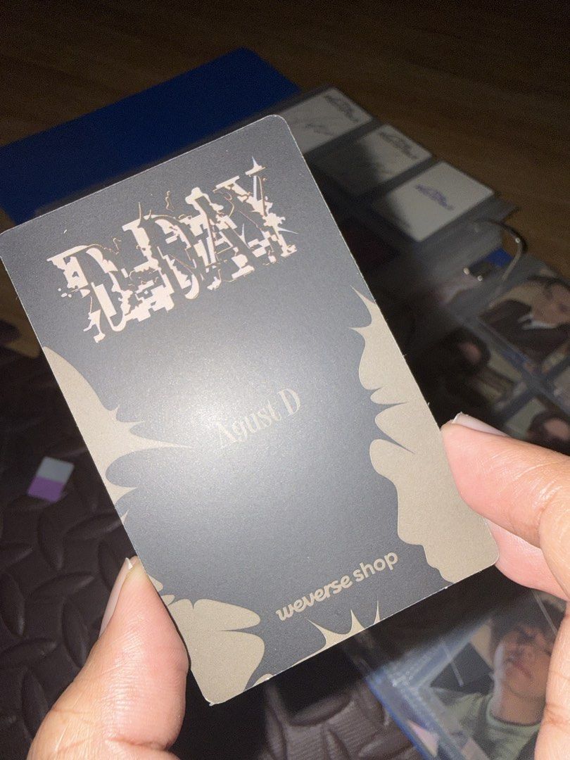 Agust D D-DAY Weverse Shop Photocard (Category: K-Wave Merchandise) located in Manila. Submitted by aizamariel82853 (Listing ID 1462621834, Image 2). Description: - Agust D D-DAY Photocard - Authentic item from Weverse Shop - Standard photocard size - Features a dark design with the D-DAY logo and Agust D's name - A must-have collectible for BTS fans and collectors.