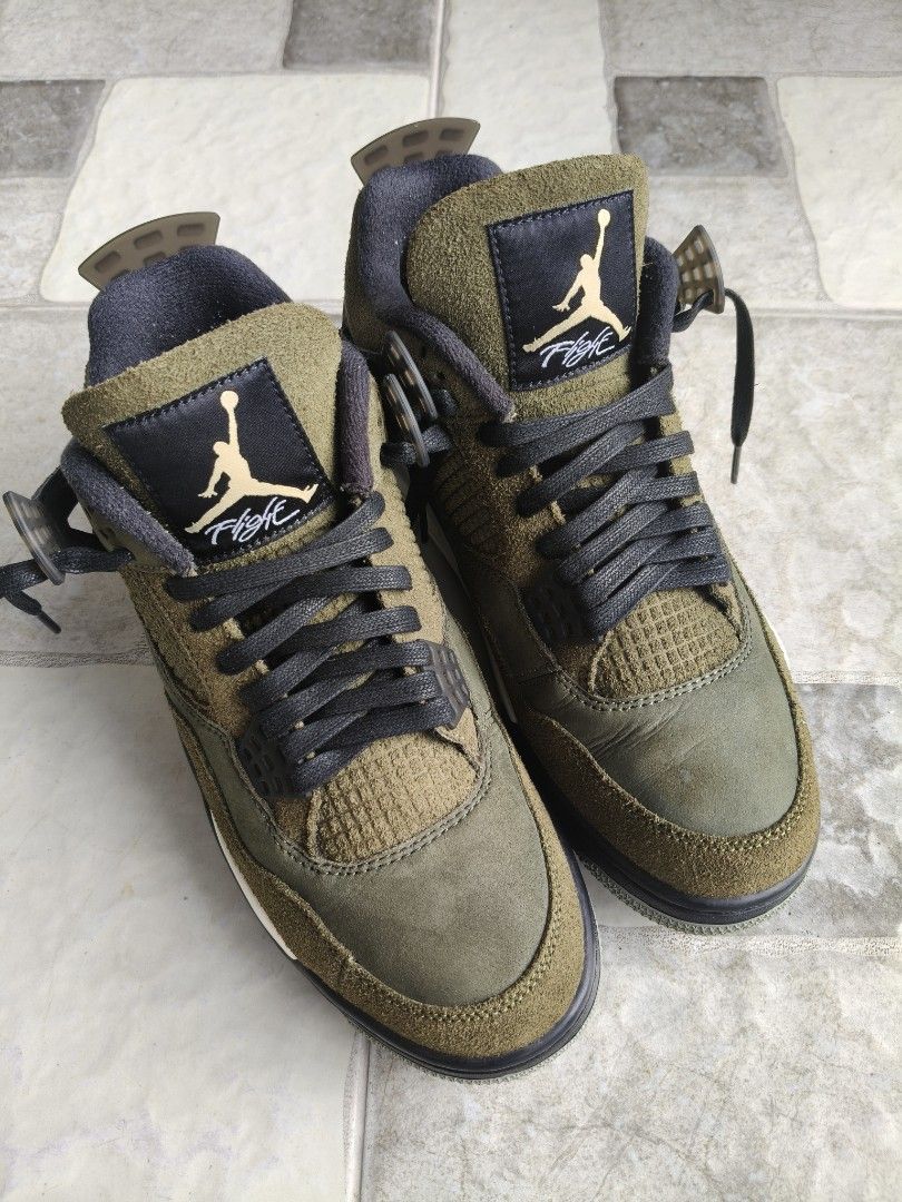 Air Jordan 4 Olive (Category: Sneakers) located in Minglanilla. Submitted by sahagunmotmot (Listing ID 1462589363, Image 3). Description: - Authentic Air Jordan 4 - Stylish olive green colorway - Premium suede and mesh upper for comfort and durability - Black laces and accents for a sleek look - White and black midsole for classic Jordan style - Durable gum outsole with iconic Jumpman logo - A must-have for any sneaker collector.