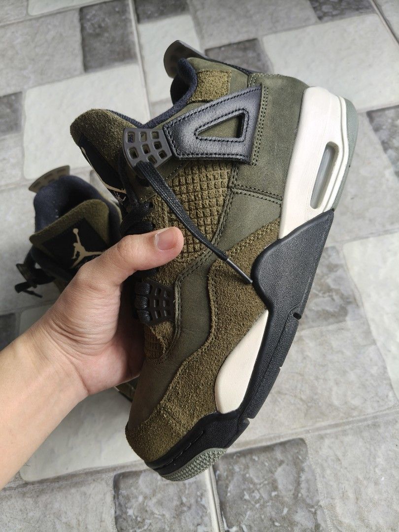 Air Jordan 4 Olive (Category: Sneakers) located in Minglanilla. Submitted by sahagunmotmot (Listing ID 1462589363, Image 2). Description: - Authentic Air Jordan 4 - Stylish olive green colorway - Premium suede and mesh upper for comfort and durability - Black laces and accents for a sleek look - White and black midsole for classic Jordan style - Durable gum outsole with iconic Jumpman logo - A must-have for any sneaker collector.