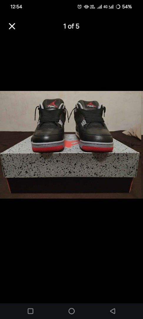 Air Jordan 4 Retro Black Red Cement (Category: Sneakers) located in Manila. Submitted by allaboutzara (Listing ID 1462666916, Image 1). Description: - Classic black and red Air Jordan 4s - Iconic cement print on midsole and heel tab - Features Nike Air branding on the heel - Comes with original box - A great addition to any sneaker collection original price : 20k pwede sa maarte panregalo like new.