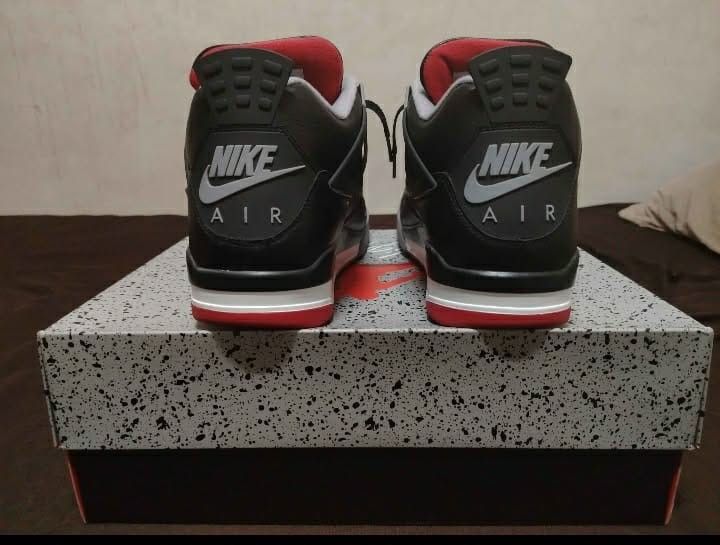 Air Jordan 4 Retro Black Red Cement (Category: Sneakers) located in Manila. Submitted by allaboutzara (Listing ID 1462666916, Image 2). Description: - Classic black and red Air Jordan 4s - Iconic cement print on midsole and heel tab - Features Nike Air branding on the heel - Comes with original box - A great addition to any sneaker collection original price : 20k pwede sa maarte panregalo like new.
