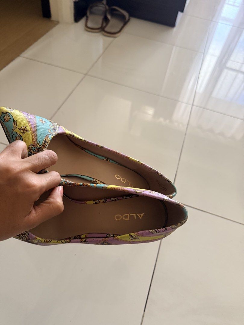 ALDO Printed Pointed Flats and Heels (Category: Flats & Sandals) located in Caloocan City. Submitted by geemariell56161 (Listing ID 1462441059, Image 2). Description: Size 6.5 - Brand: ALDO - Style: Pointed Flats (slip-on) & Heels (stiletto) - Design: Cute pastel print with gold accents - Perfect for: Adding a pop of color to any outfit.