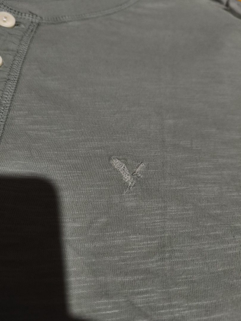 American Eagle Henley T-shirt Size L (Category: Tshirts & Polo Shirts ) located in Pasig City. Submitted by althentic.ph (Listing ID 1462635828, Image 2). Description: 220 + J&T Shipping Fee AMERICAN EAGLE Henley Buttoned Shirt For Men Olive Green Size LARGE on tag, fits to XL Actual Measurements: Width - 24" Length - 29" EXCELLENT Thrifted Condition 9+/10 ✔Tags are available upon request, can be sent thru PM ✔fix price ✔payment first policy thru