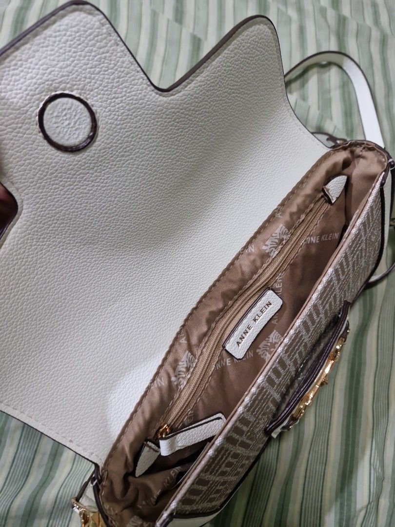Anne Klein Flap Shoulder (Category: Cross-body Bags) located in Manila. Submitted by inaydearest (Listing ID 1462443215, Image 3). Description: color: Vanilla with cross body strap Negotiable price .