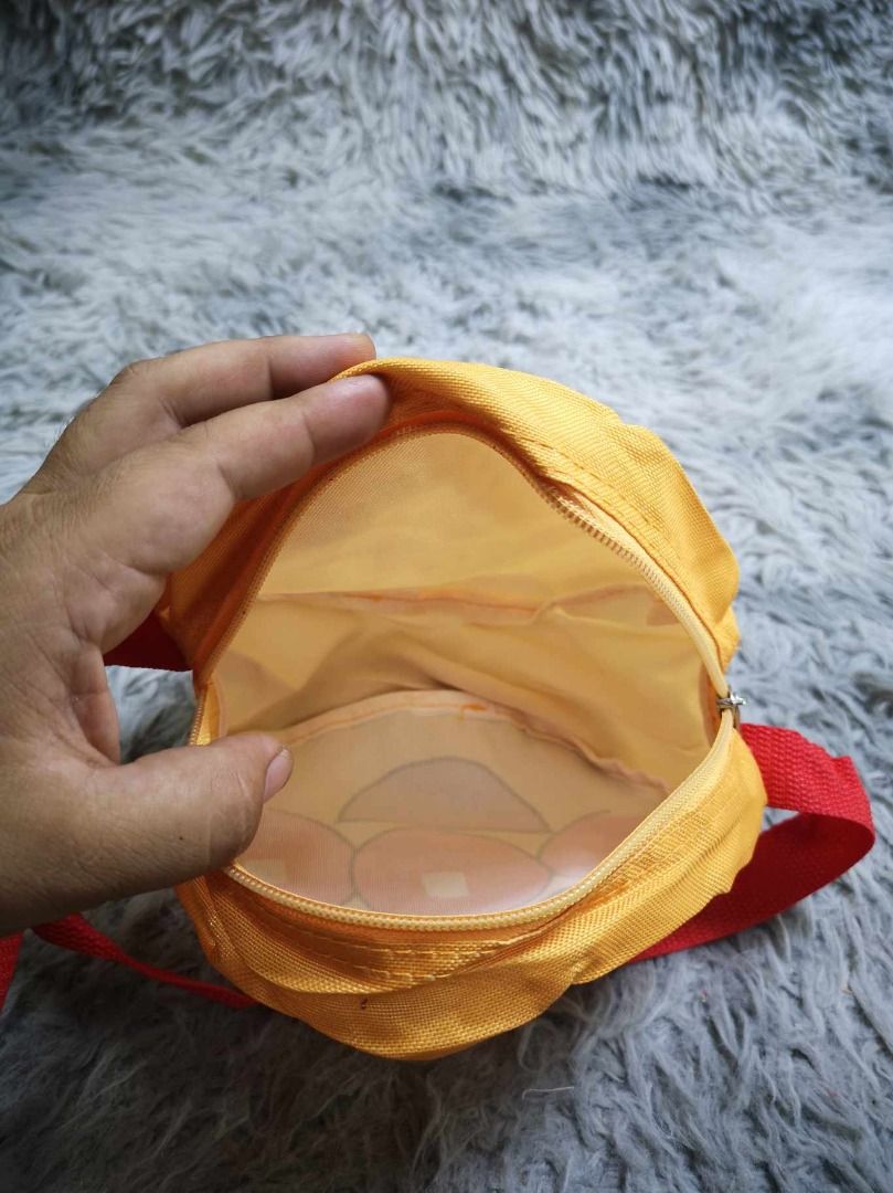 Anpanman Face Compact Pouch Kida Crossbody Bag (Category: Cross-body Bags) located in Santa Cruz. Submitted by jmy_surplus.2 (Listing ID 1462479268, Image 3). Description: Size ; L - 8 W - 8.4 Color ; Brown Type ; Crossbody bag Brand ; No brand Material ; Rayon Style ; Round Zipper Closure Kids Crossbody bag LR 129 JMY 1 Batch #221.