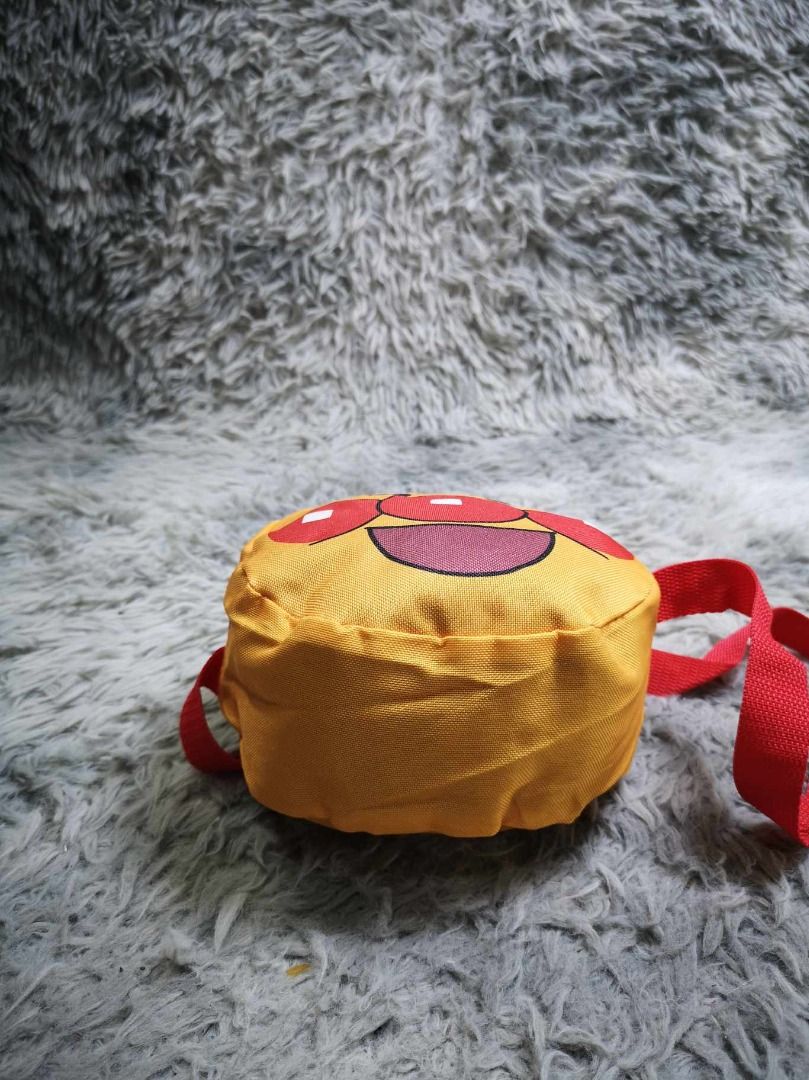 Anpanman Face Compact Pouch Kida Crossbody Bag (Category: Cross-body Bags) located in Santa Cruz. Submitted by jmy_surplus.2 (Listing ID 1462479268, Image 2). Description: Size ; L - 8 W - 8.4 Color ; Brown Type ; Crossbody bag Brand ; No brand Material ; Rayon Style ; Round Zipper Closure Kids Crossbody bag LR 129 JMY 1 Batch #221.