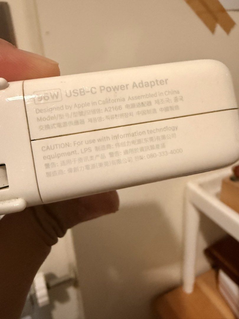 Apple Macbook 96W USB-C Power Adapter Model A2166 (Category: Chargers & Cables) located in Mandaluyong City. Submitted by ohayouclub (Listing ID 1462521226, Image 2). Description: - Genuine Apple 96W USB-C Power Adapter - Model: A2166 - Prongs are dented but still usable - Confirmed working - Reason for selling: Macbook Pro got bricked so we have no use for this anymore.