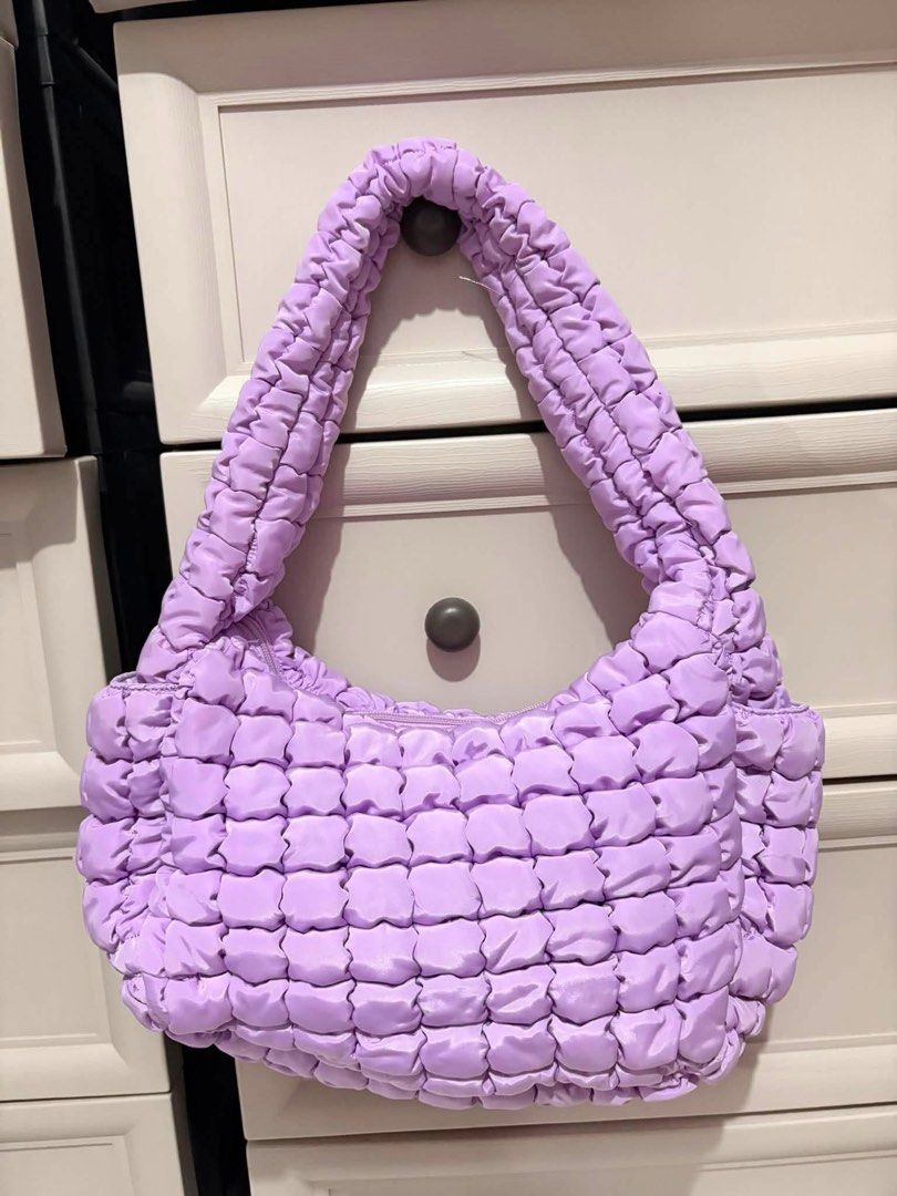 Archetype Puffy Shoulder Bag - Lavender (Category: Shoulder Bags) located in Mandaluyong City. Submitted by gentle.segoviajam (Listing ID 1462483637, Image 2). Description: - Super cute lavender puffy shoulder bag - Brand: Archetype - Features quilted texture - Zip closure - Comfortable strap - Great for everyday use or a night out - Fits essentials easily.