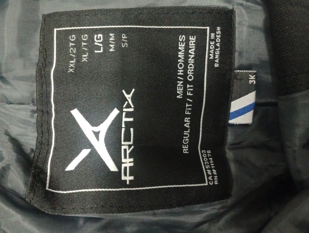 Arctix Black Ski Pants Regular Fit Men's Size L (Category: Trousers) located in Manila. Submitted by annemanzano120906 (Listing ID 1462552735, Image 3). Description: - Brand: Arctix - Type: Ski Pants - Gender: Men's - Fit: Regular - Size: L - Material: Durable and warm fabric with smooth inner lining - Features: Elasticated waistband, ankle zippers for boot access - Origin: Made in Bangladesh - Ideal for: Ski trips and cold weather activities.